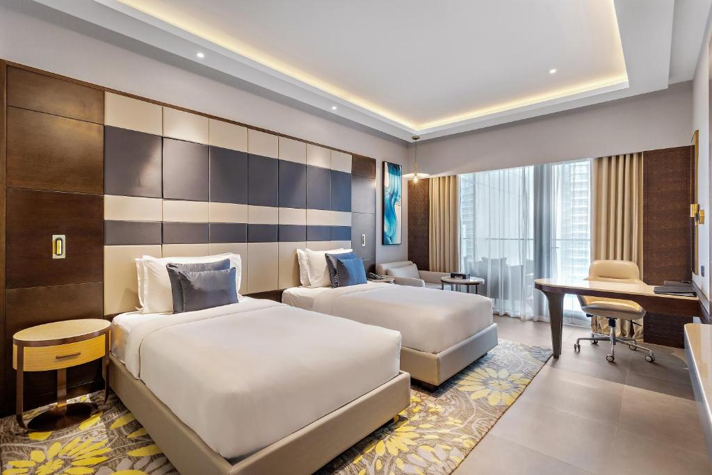 أحد فنادق دبي مع مسبح خاص رخيصة المميزَّة